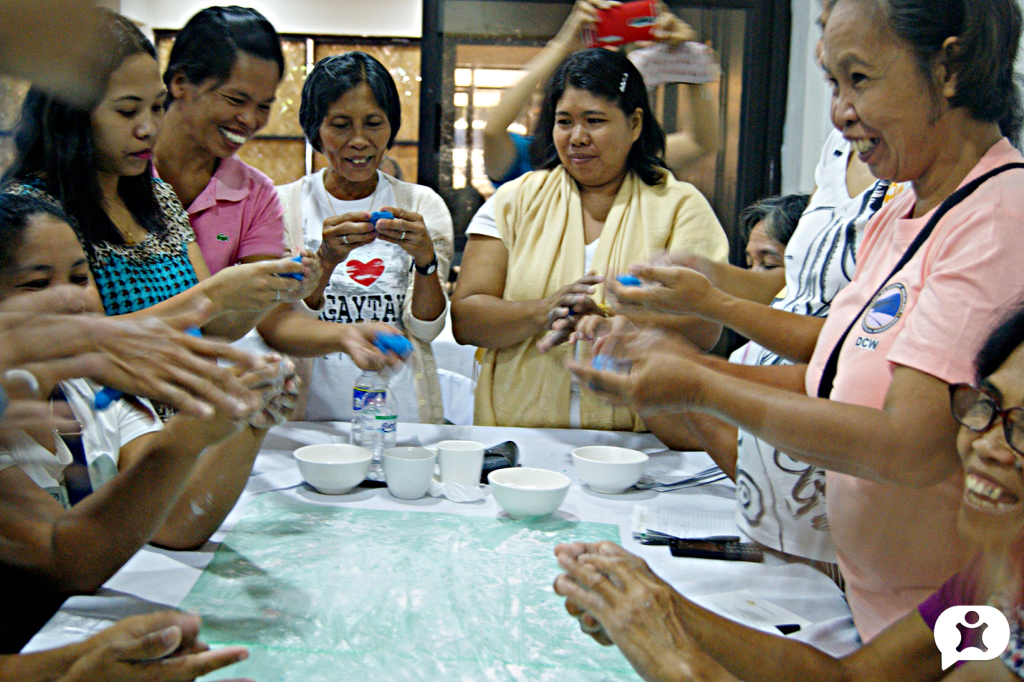 Participants enjoy the dough-making activity during Day 4 of the Training on Early Learning Curriculum for Child Development Workers held in Castilla, Sorsogon on 12-16 June 2017. 